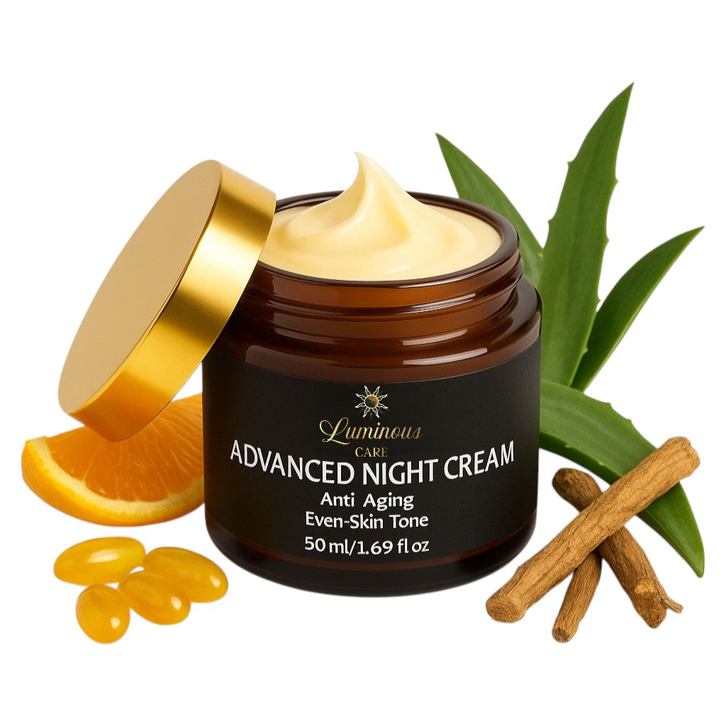 Open jar of Luminous Care Advanced Night Cream 50 ml on white background, surrounded by retinol capsules, orange slice, aloe vera leaf, and licorice root, showcasing anti-aging, moisturizing, and even-skin-tone benefits