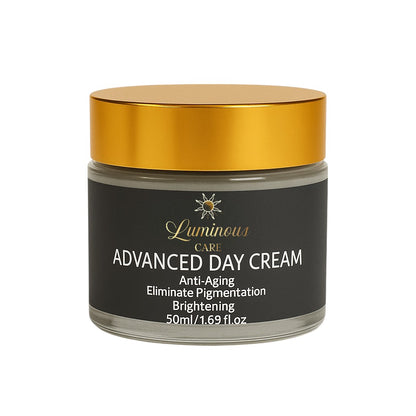 Luminous Care Advanced Day Cream in a 50 ml glass jar with a dark gray label and gold lid, an anti-aging brightening moisturizer formulated to eliminate pigmentation